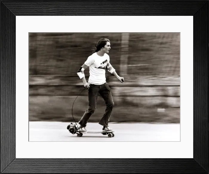 Framed Print : Skateboarding - Tim Lewis, on a motorised skateboard, for a promotional film Framed Print : Skateboarding - Tim Lewis, on a motorised skateboard, for a promotional film