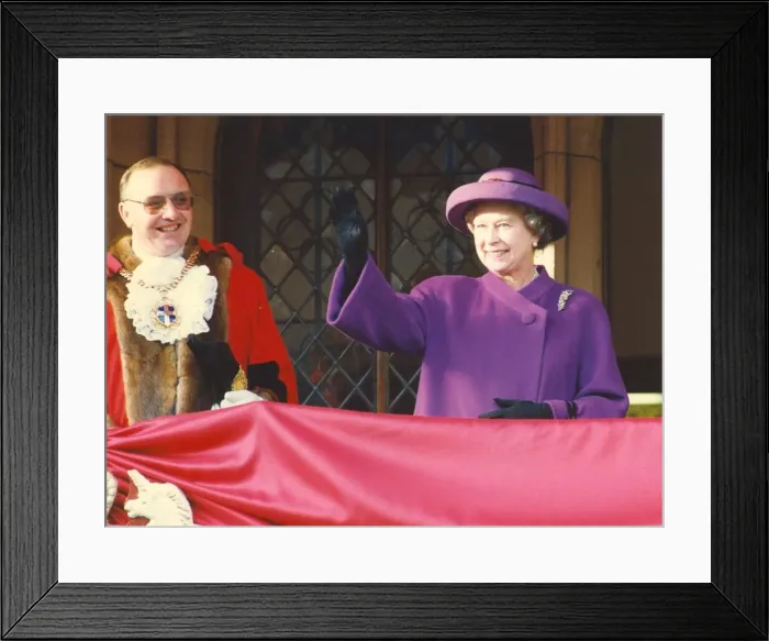Framed Print : Queen Elizabeth II and Prince Philip visit Durham - Waving to the crowds at Durham Castle