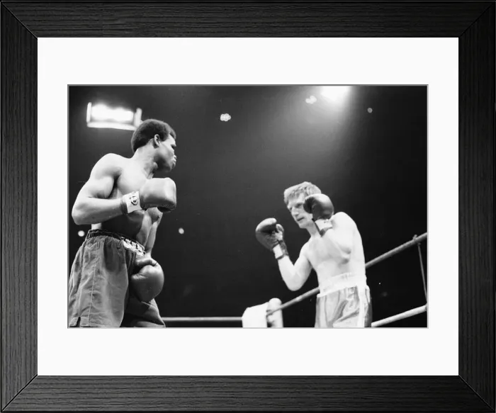 Framed Print : Colin Jones of Wales seen here in action against Kirkland Laing. 28th April 1981 Framed Print : Colin Jones of Wales seen here in action against Kirkland Laing. 28th April 1981