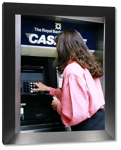 The Royal Bank of Scotland ATM Machine Woman pictured using cashline machine