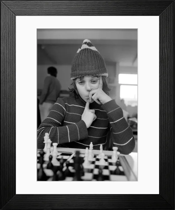 Framed Print : East End Kids Chess Congress: A West Ham supporter, complete with his West Ham hat makes Framed Print : East End Kids Chess Congress: A West Ham supporter, complete with his West Ham hat makes