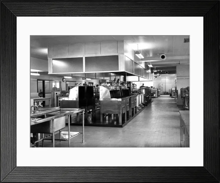 Framed Print : The new Woolworth cafaterias stainless steel kitchen. Next to them is the bakehouse Framed Print : The new Woolworth cafaterias stainless steel kitchen. Next to them is the bakehouse