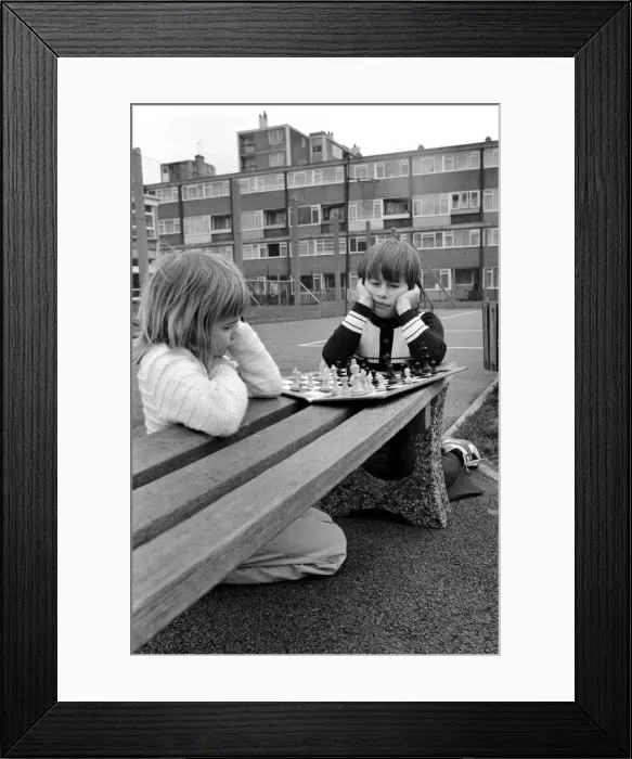 Framed Print : East End Kids Chess Congress: Practising in the playground in Stepney L / R 7-year-old Framed Print : East End Kids Chess Congress: Practising in the playground in Stepney L / R 7-year-old