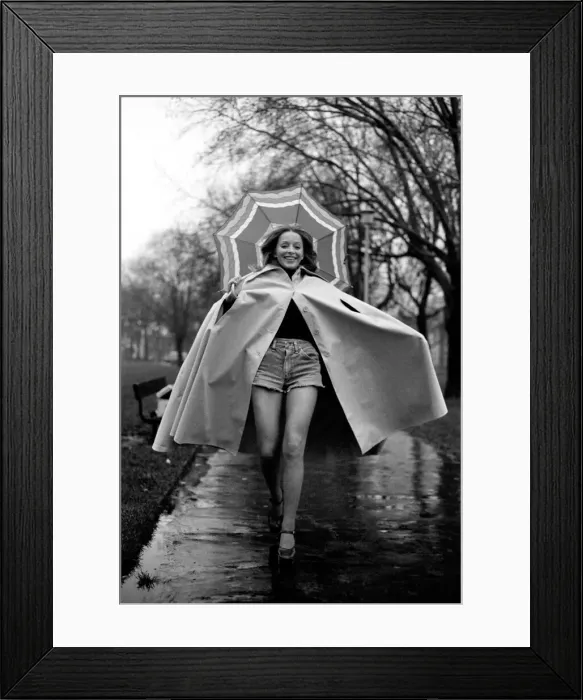 Framed Print : Woman / Umbrella / Humour: Actress Cheryl Gilham. January 1975 75-00534-005 Framed Print : Woman / Umbrella / Humour: Actress Cheryl Gilham. January 1975 75-00534-005