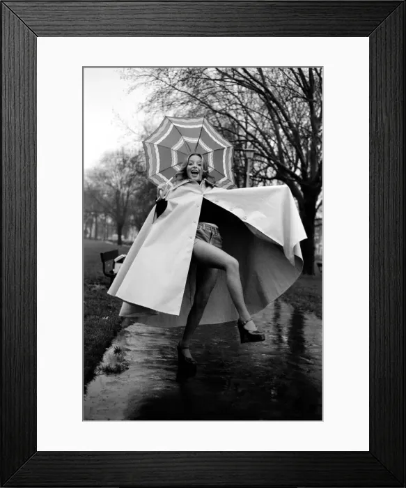 Framed Print : Woman / Umbrella / Humour: Actress Cheryl Gilham. January 1975 75-00534-007 Framed Print : Woman / Umbrella / Humour: Actress Cheryl Gilham. January 1975 75-00534-007