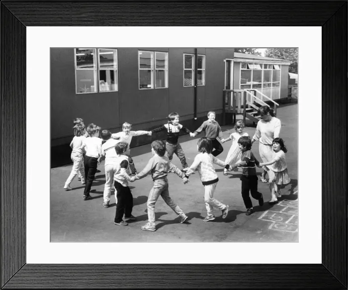 Framed Print : Youngsters enjoying playtime with a game ring o roses Framed Print : Youngsters enjoying playtime with a game ring o roses