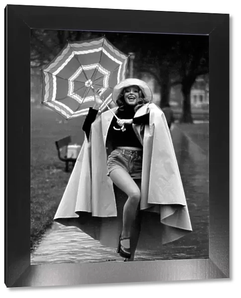 Woman  /  Umbrella  /  Humour: Actress Cheryl Gilham. January 1975 75-00534-002