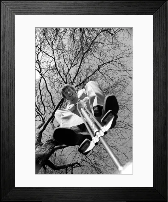 Framed Print : Roy Castle on a pogo stick. January 1975 75-00573-001