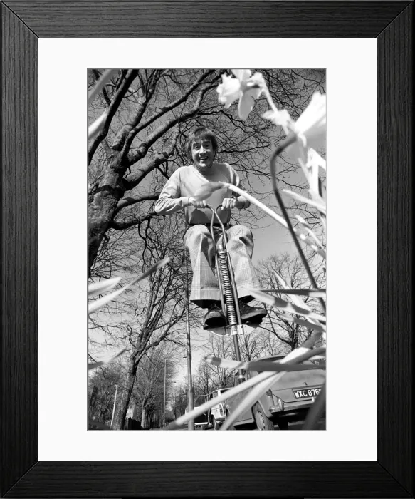 Framed Print : Roy Castle on a pogo stick. January 1975 75-00573-004