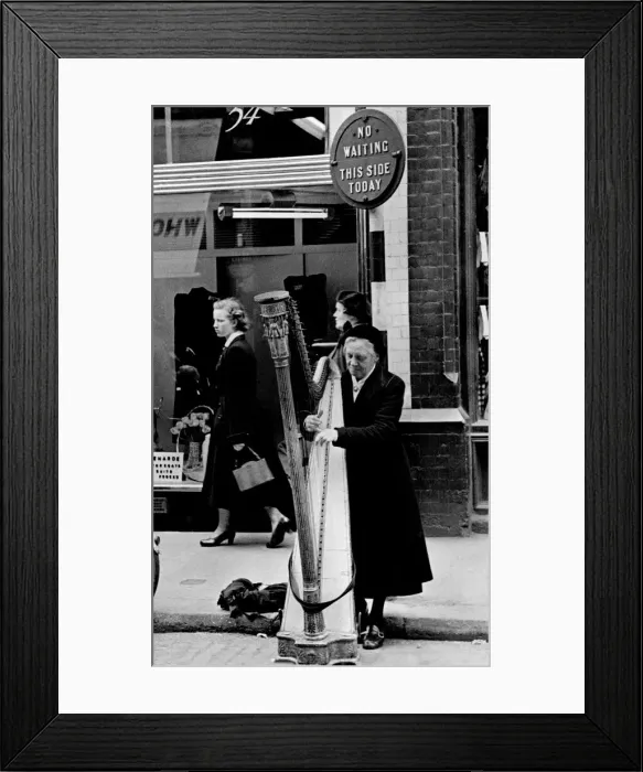 Framed Print : Streets Entertainers. Harp player in Dublin Street. May 1951 P004921