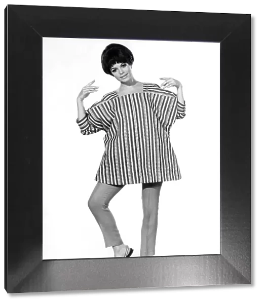 Reveille Fashions: Carol Chilves modelling smock top. August 1967 P006706