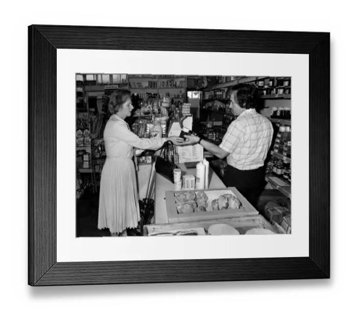 Framed Print : Careful Shopper: Mrs. Margaret Thatcher with grocer John Shean. March 1983 P005083