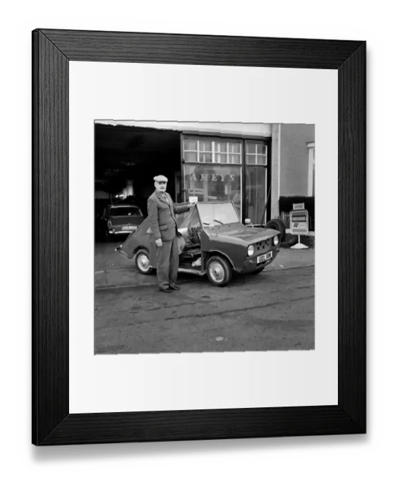Framed Print : Electric Car  /  Hybrid Car: New car invention. Mr. John de Grunchy