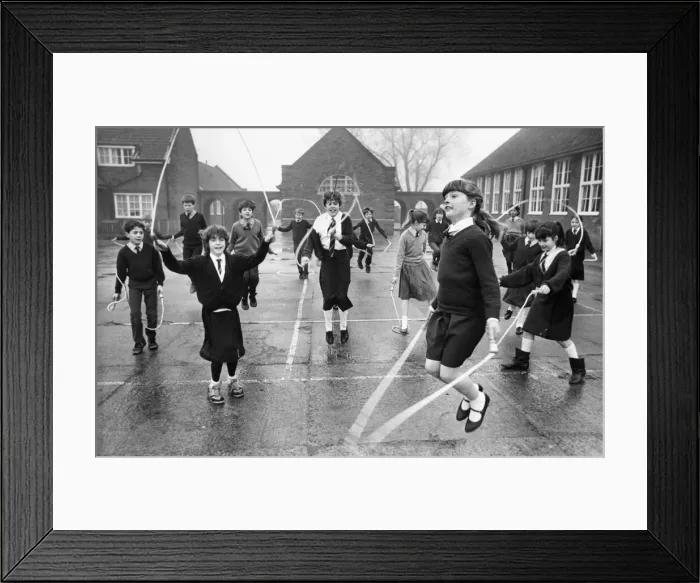 Framed Print : Pupils at Gosforth Central Middle School enjoy a skipping session as part of the British Framed Print : Pupils at Gosforth Central Middle School enjoy a skipping session as part of the British