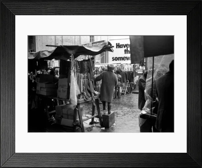 Framed Print : Last of the big spenders at Petticoat Lane. This lady stall holder uses a box to keep up Framed Print : Last of the big spenders at Petticoat Lane. This lady stall holder uses a box to keep up
