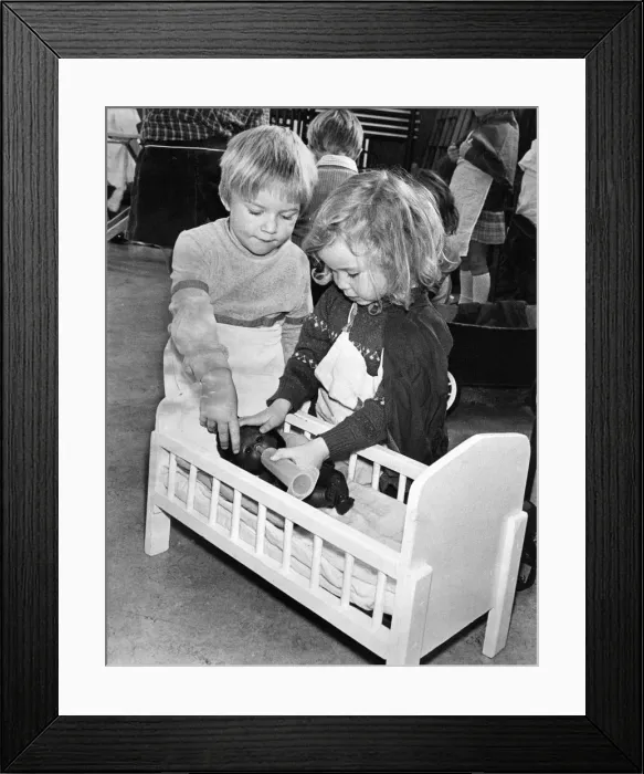 Framed Print : Looking after baby - the modern way - are these two little smashers from the Denton Burn