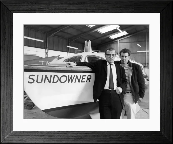 Framed Print : Geoff Godwin and Larry Rodney with the boat Sundowner Framed Print : Geoff Godwin and Larry Rodney with the boat Sundowner