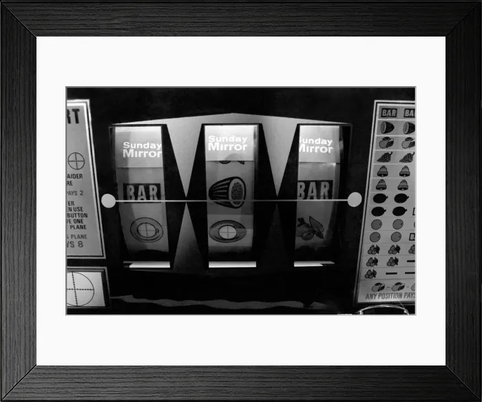 Framed Print : Fruit machines / Arcades / Amusements / Gambling. January 1975 75-00158-005 Framed Print : Fruit machines / Arcades / Amusements / Gambling. January 1975 75-00158-005