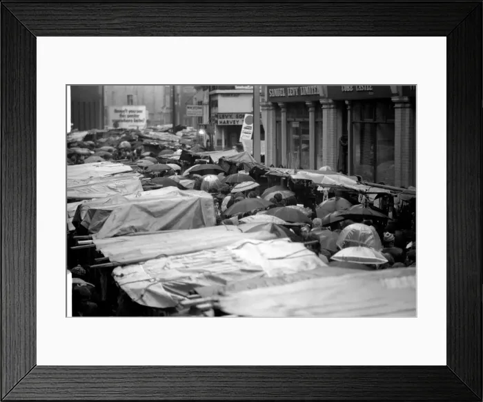 Framed Print : Last of the big spenders at Petticoat Lane. The scene in Petticoat Lane Framed Print : Last of the big spenders at Petticoat Lane. The scene in Petticoat Lane