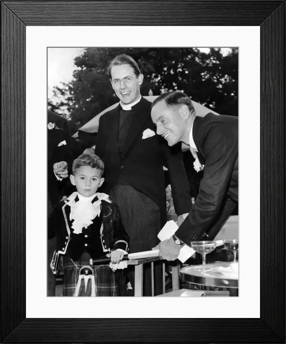 Framed Print : Peter May, is here seen Autographing a cricket bat for Young Charles Douglas, Aged 6 Framed Print : Peter May, is here seen Autographing a cricket bat for Young Charles Douglas, Aged 6