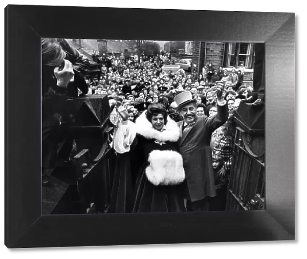 Pat Phoenix wedding at Broadbottom. Elsie Tanner and Alan Howard wave to the crowds after