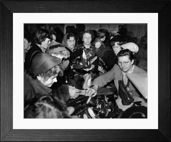 Framed Print : Affleck and Brown sales: Shoes at give away prices was the target of these women as they Framed Print : Affleck and Brown sales: Shoes at give away prices was the target of these women as they