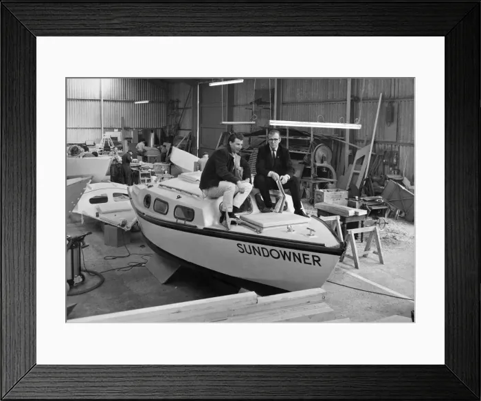 Framed Print : Geoff Godwin and Larry Rodney with the boat Sundowner Framed Print : Geoff Godwin and Larry Rodney with the boat Sundowner