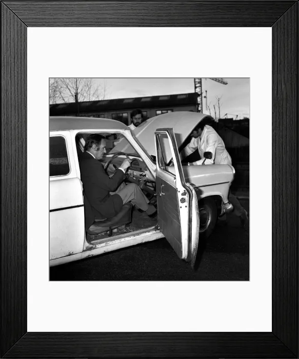 Framed Print : Man / Car / Unusual / Humour. Car at I. P. C. Hemel Hempstead car examiner Framed Print : Man / Car / Unusual / Humour. Car at I. P. C. Hemel Hempstead car examiner