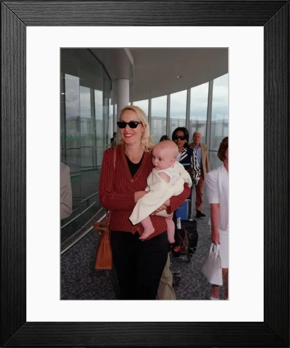 Framed Print : Jerry Hall Model June 98 Arriving at heathrow airport from Nice with her new baby Framed Print : Jerry Hall Model June 98 Arriving at heathrow airport from Nice with her new baby
