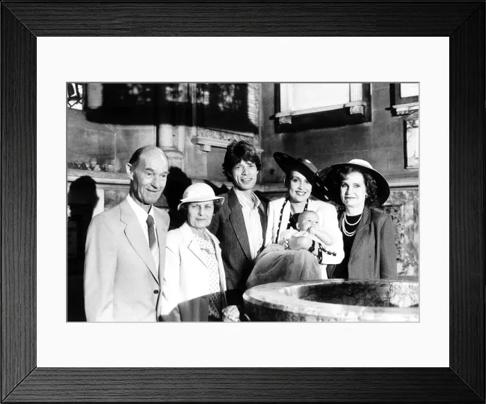 Framed Print : Mick Jagger with Jerry Hall and family at the christening of their daughter Elizabeth Framed Print : Mick Jagger with Jerry Hall and family at the christening of their daughter Elizabeth