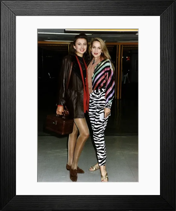 Framed Print : Julia Kurotchinka former Miss World with model Jerry Hall arriving back to Heathrow Framed Print : Julia Kurotchinka former Miss World with model Jerry Hall arriving back to Heathrow