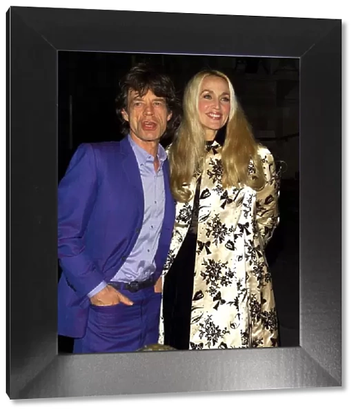 Mick Jagger and Jerry Hall December 1999 arrive for the Barbie Ball
