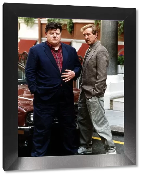Robbie Coltrane Actor with Eric Idle Actor from 'Nuns on the Run'