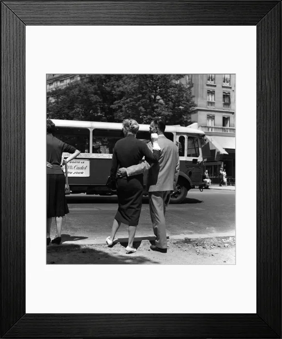 Framed Print : France Paris -A man with his arm around the waist of his girlfriend waits to cross Framed Print : France Paris -A man with his arm around the waist of his girlfriend waits to cross