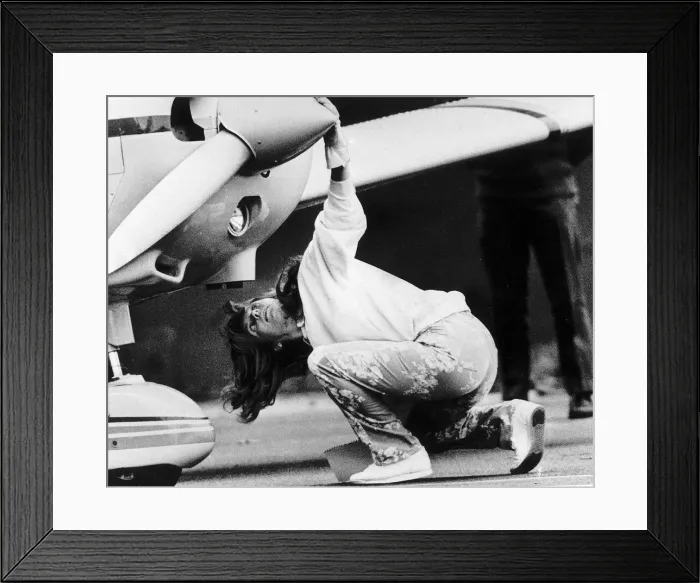 Framed Print : Duchess The York looks under plane Framed Print : Duchess The York looks under plane