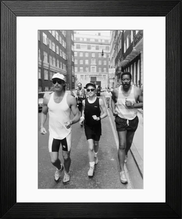 Framed Print : Madonna Pop Singer going for a run with her Bodygaurds Framed Print : Madonna Pop Singer going for a run with her Bodygaurds