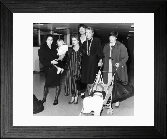 Framed Print : Mick Jagger Singer at Heathrow Airport about to leave on Concorde with his lover Jerry Framed Print : Mick Jagger Singer at Heathrow Airport about to leave on Concorde with his lover Jerry