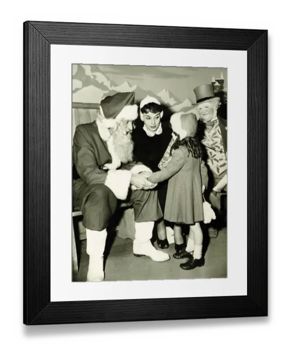 Framed Print : Audrey Hepburn November 1950 Father Christmas Framed Print : Audrey Hepburn November 1950 Father Christmas