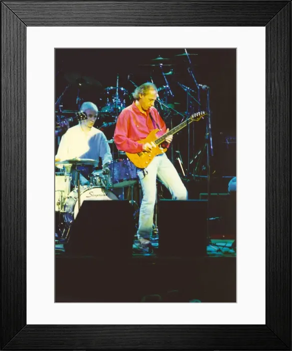 Framed Print : Mark Knopfler, formerly of Dire Straits, play with his alternative band the Notting Framed Print : Mark Knopfler, formerly of Dire Straits, play with his alternative band the Notting
