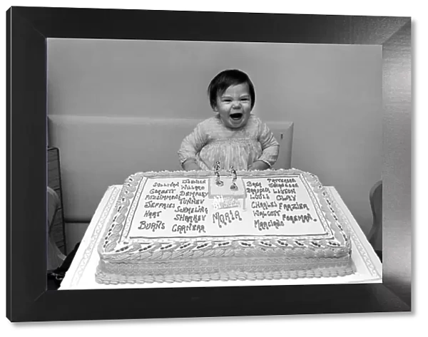 Maria Browns celebrates her first birthday. Marias father, a boxing enthusiast