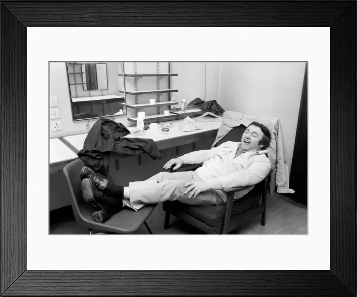 Framed Print : Comedian Les Dawson relaxing in his dressing room at Yorkshire Television studios Framed Print : Comedian Les Dawson relaxing in his dressing room at Yorkshire Television studios