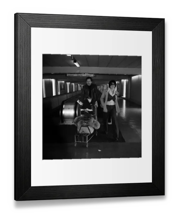 Framed Print : Actress Joan Collins and her husband Ron Kass and their 2 year old daughter Katyania