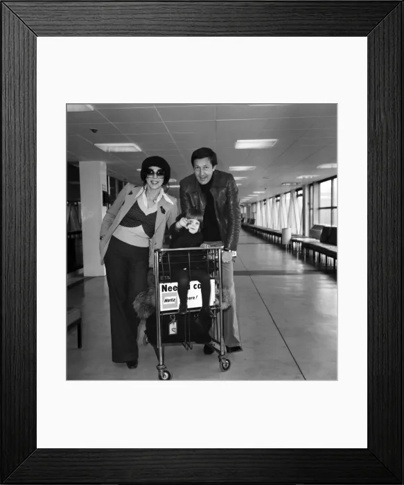 Framed Print : Actress Joan Collins and her husband Ron Kass and their 2 year old daughter Katyania