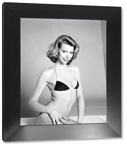 Glamour Models posing Delia Whittaker wearing a bikini top February 1975