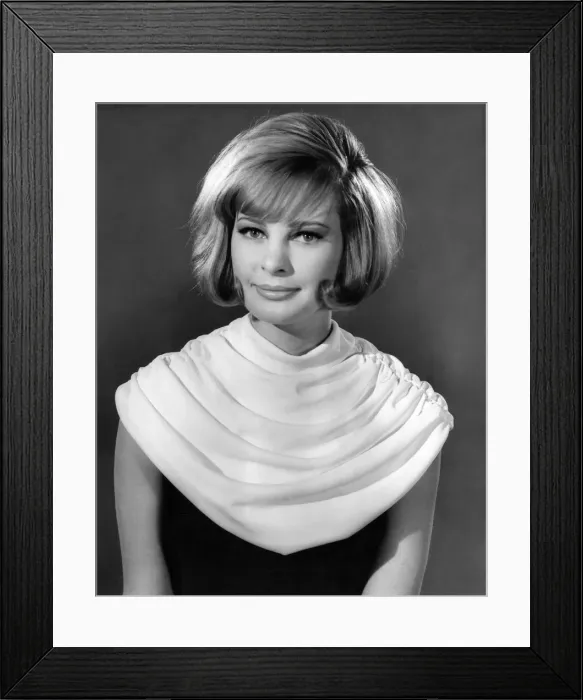 Framed Print : Model wearing a white neck scarf January 1963 P007634 Framed Print : Model wearing a white neck scarf January 1963 P007634