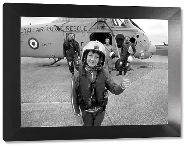 Lee Goodey seen here taking a flight with the crew of a RAF Westland Wessex Search