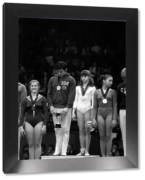 Lutz Mack with Nadia Comaneci with their trophies after winning the '