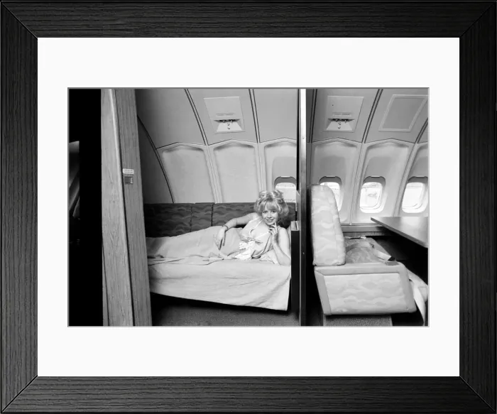 Framed Print : Jumbo Jet: Sleeping: First Class: Bedroom in the Sky: 23 year old model Jenny Clare