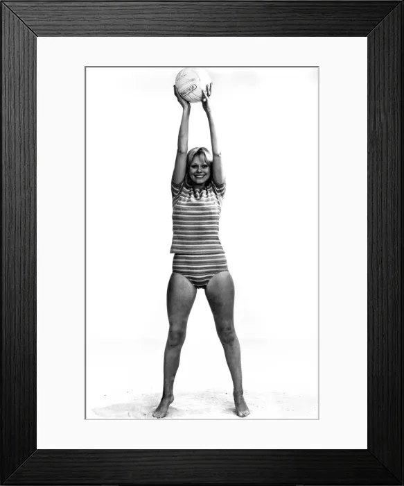 Framed Print : Woman doing her slimming exercises using a beach ball. Circa 1966 Framed Print : Woman doing her slimming exercises using a beach ball. Circa 1966