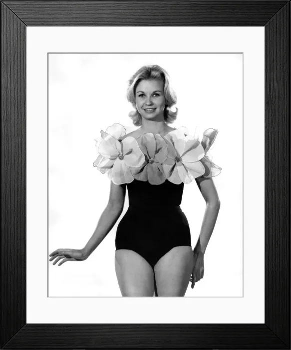 Framed Print : Model Windy Tripp wearing a one piece swimsuit with elaborate floral design trim
